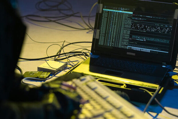 Hacker at computer testing cybersecurity in Sherman Oaks