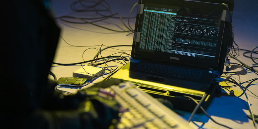 Cybersecurity Sherman Oaks Hacker at computer testing cybersecurity in Sherman Oaks